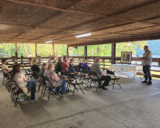 Small gathering listening to a speaker