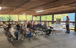 Small gathering listening to a speaker