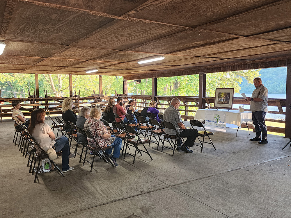 Small gathering listening to a speaker